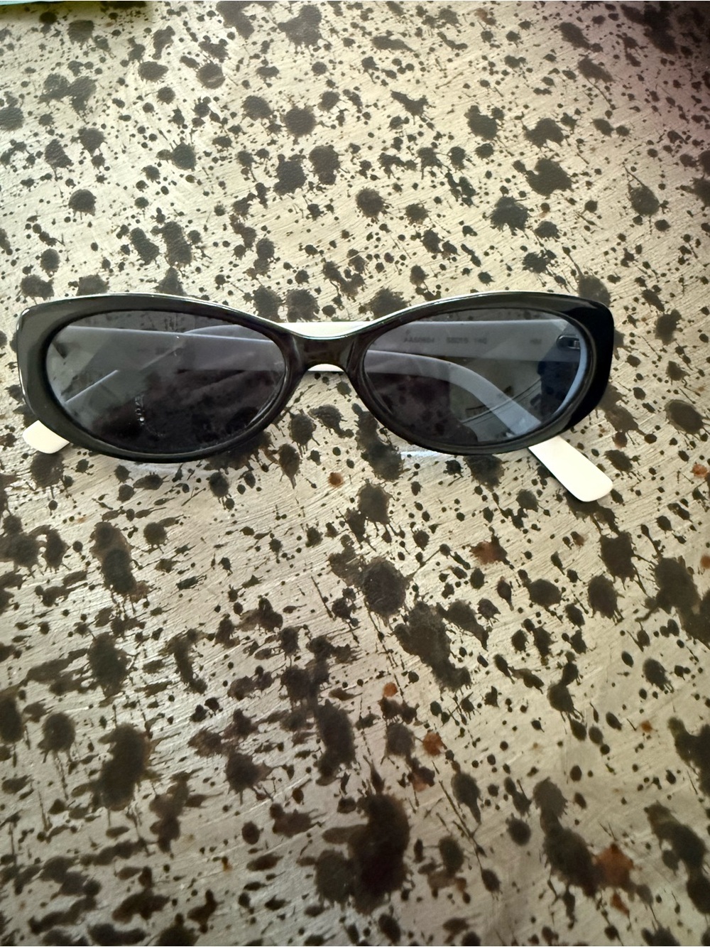 Anna Sui Black Cat-Eye Sunglasses with White Temples